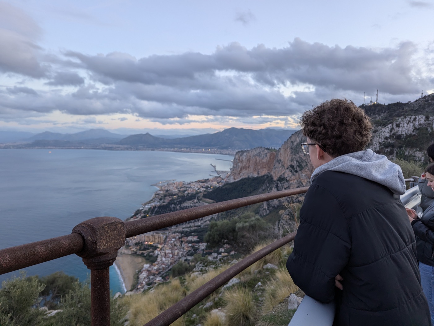 Looking out over the coast from a clifftop viewpoint at dusk